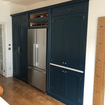 Stunning classic dark blue kitchen with a cafe style feel