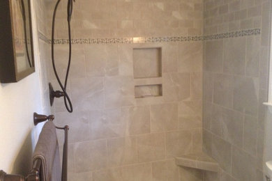 Walk-in shower - mid-sized modern master gray tile and porcelain tile marble floor walk-in shower idea in Raleigh