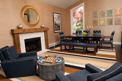 This is an example of a mid-sized eclectic formal open concept living room in New York with dark hardwood floors, a standard fireplace and a stone fireplace surround.