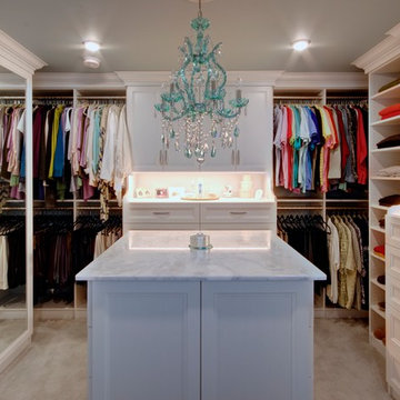 Large White Textured Walk-In Closet with Island