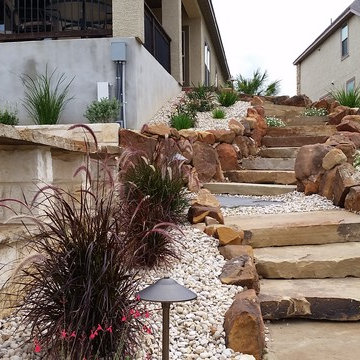 Multi-Level Patio with Hot Tub Water Feature and Boulder Staircase