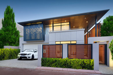 Design ideas for a contemporary three-storey house exterior in Perth with metal siding, a hip roof and a metal roof.
