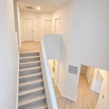 Minimalistic Plaster curved staircase - Saulty Dr, Sterling