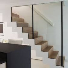 glass wall between kitchen/hall/stairs