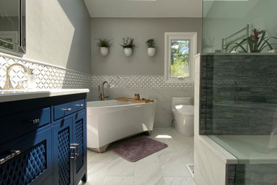 Example of a bathroom design in Chicago with blue cabinets