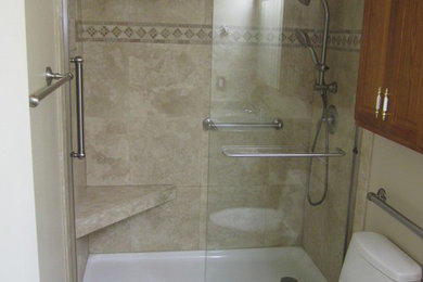 Example of a small classic kids' brown tile and stone slab travertine floor bathroom design in Orange County