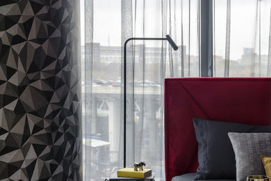 Photo of a small contemporary master bedroom in Moscow with brown floor and grey walls.