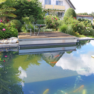 Garten mit Urlaubsflair und Koiteich