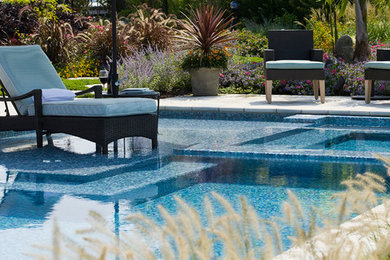 Beach style pool photo in New York