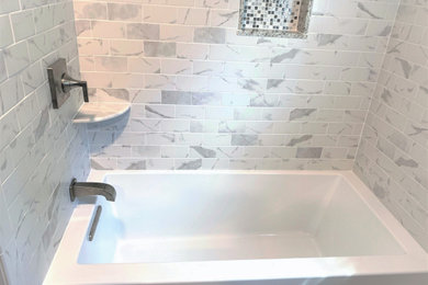 Example of a transitional bathroom design in Boston