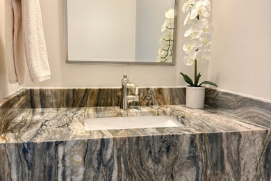 Inspiration for a powder room remodel in Miami