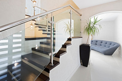 Trendy staircase photo in Other