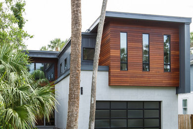 Mid-sized trendy two-story wood exterior home photo in Jacksonville