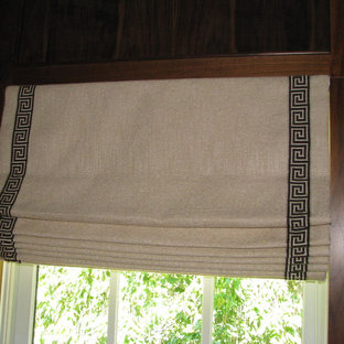 Inspiration for a medium sized modern study in Raleigh with brown walls.