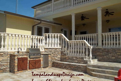 Example of a tuscan patio design in Tampa