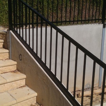Tubular fence with handrail manufactured and installed by BPS