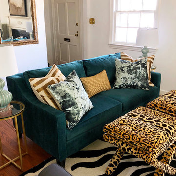 Teal sofa with accent pillows