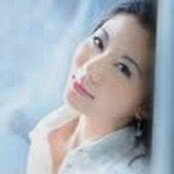 Lucy Qis foto