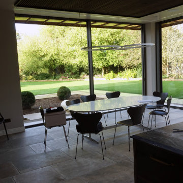 Home extension with supersized sliding glass doors
