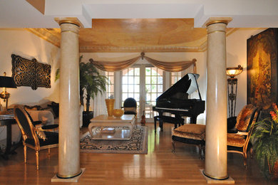 Example of a tuscan living room design in Tampa