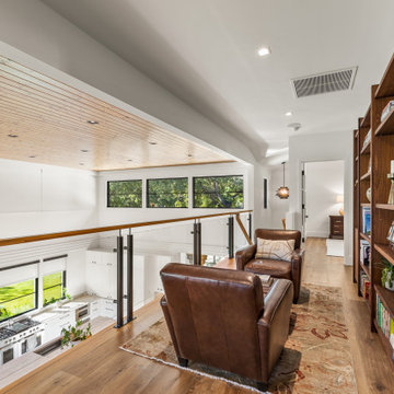 Cozy Landing Library with Balcony