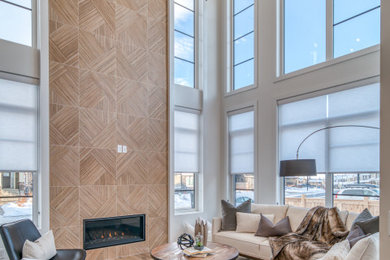 Example of a large transitional formal and open concept light wood floor and beige floor living room design in Calgary with white walls and no tv