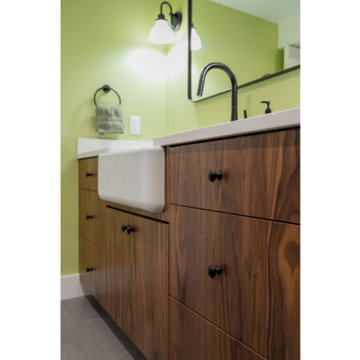 Walnut Bathroom Vanity with White Farmhouse Sink and Matte Black Hardware