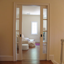 Basement pocket doors