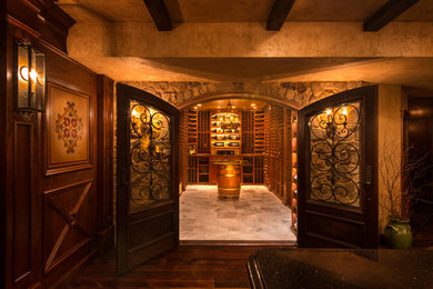 Mid-sized traditional wine cellar in DC Metro with limestone floors, storage racks and beige floor.