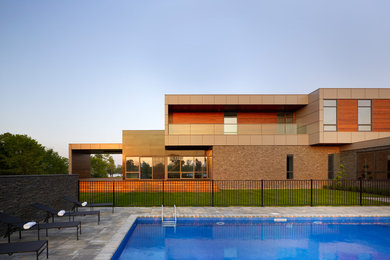 Example of a minimalist exterior home design in Toronto
