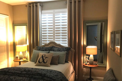 Inspiration for a mid-sized timeless guest carpeted bedroom remodel in Houston with beige walls and no fireplace