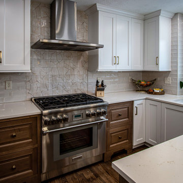 Two Tone Kitchen with Floating Shelves and Island Seating and Updated Fireplace