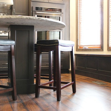 DuraSupreme Peppercorn Kitchen With Cambria Tops and Black Stainless Appliances