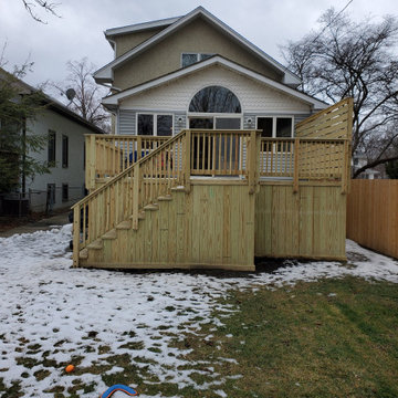 Raised Pressure Treated Pine Deck with Privacy Fence in Oak Park, IL