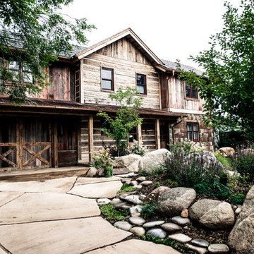 Carbondale Residence pallet of reclaimed barn wood siding and timbers