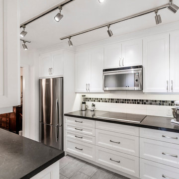 Condo White Galley Kitchen