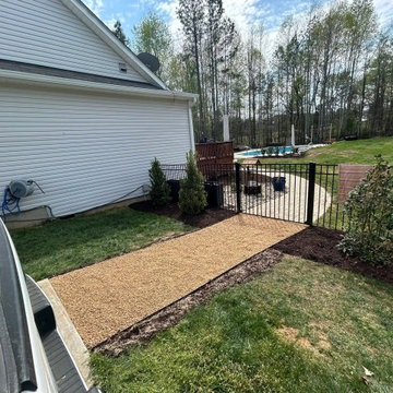 Custom Turf Landscape Area with Stone Border