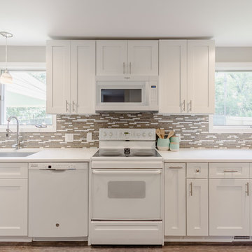 White Cabinets w/ Bar Height Peninsula