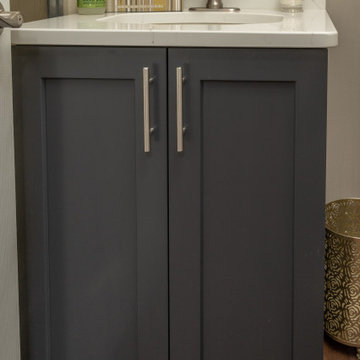 Powder room vanity is well coordinated