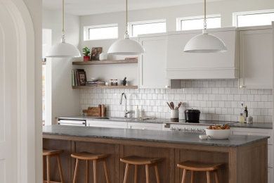 Arts and crafts kitchen photo in Calgary