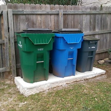 Limestone Patio For Trash Bins.