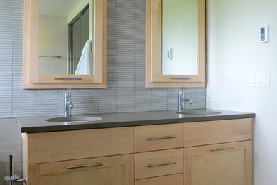 Inspiration for a contemporary master gray tile bathroom remodel in Other with shaker cabinets, light wood cabinets and quartzite countertops