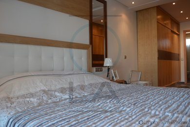 Minimalist bedroom photo in Other