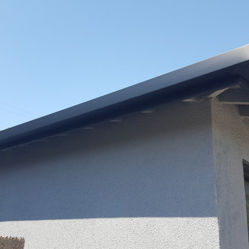 Black Gutters and Downspouts Contemporary Home, West Los Angeles