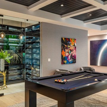 Bundy Drive Brentwood, Los Angeles, modern home game room with luxury wine stora
