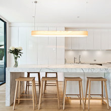 kitchen - marble benchtop and white cupboards