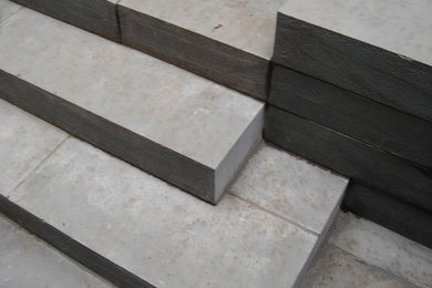 Patio - contemporary backyard stone patio idea in New York