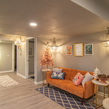 Basement Utilizing Open Space to Shoot Pool and Watch Favorite Sports Team