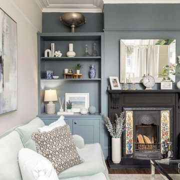 Calm & serene living room with a mix of chrome & brass metal accents