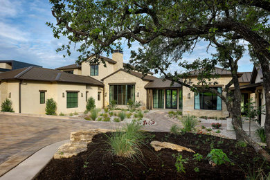 Example of a transitional exterior home design in Austin